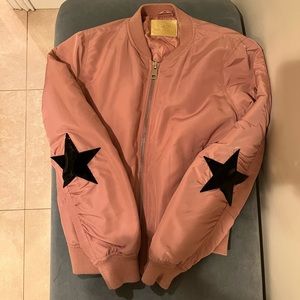 Light pink bomber with design on back